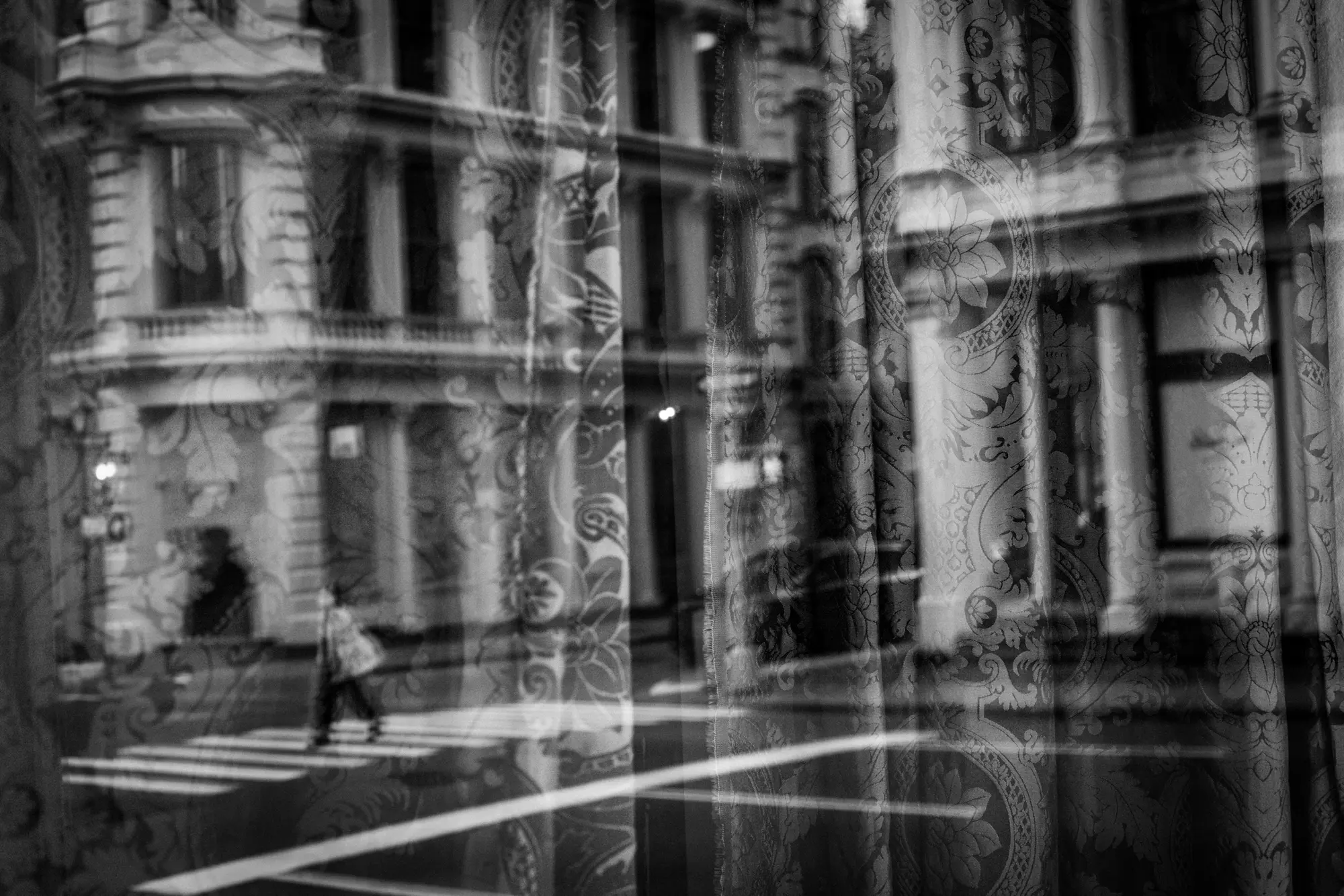 Layered reflections across a New York building